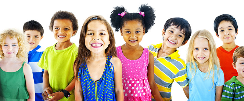 A group of diverse children with colorful clothing, posing for a photo.